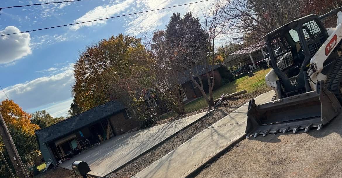 Completed Concrete Driveway Replacement installation in Charlotte, NC by Local Concrete Co — concrete contractor serving the Charlotte metro and Triangle since 2018, no deposit, no progress payments.