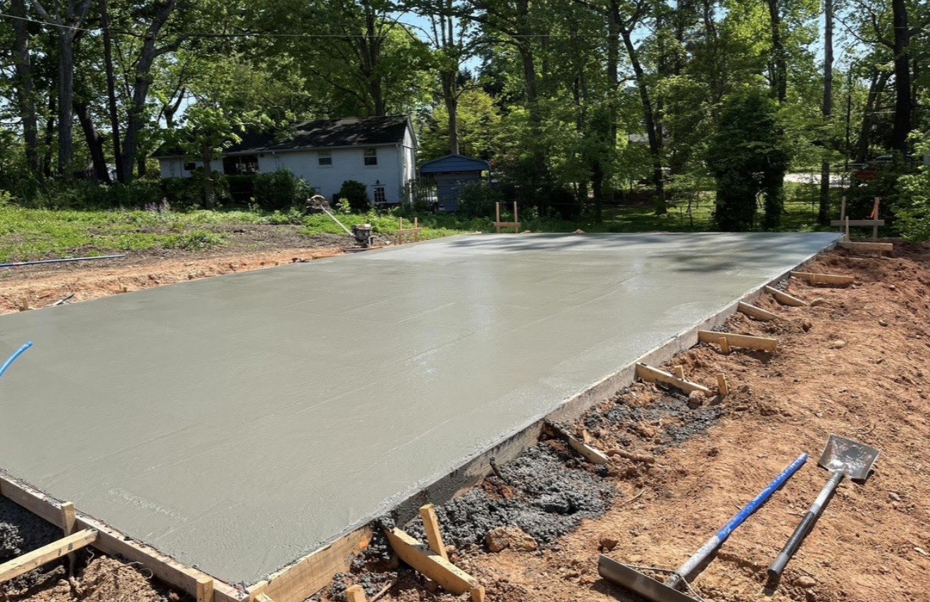 Floating the Surface Flat — step 11 of a Local Concrete Co project in Charlotte, NC