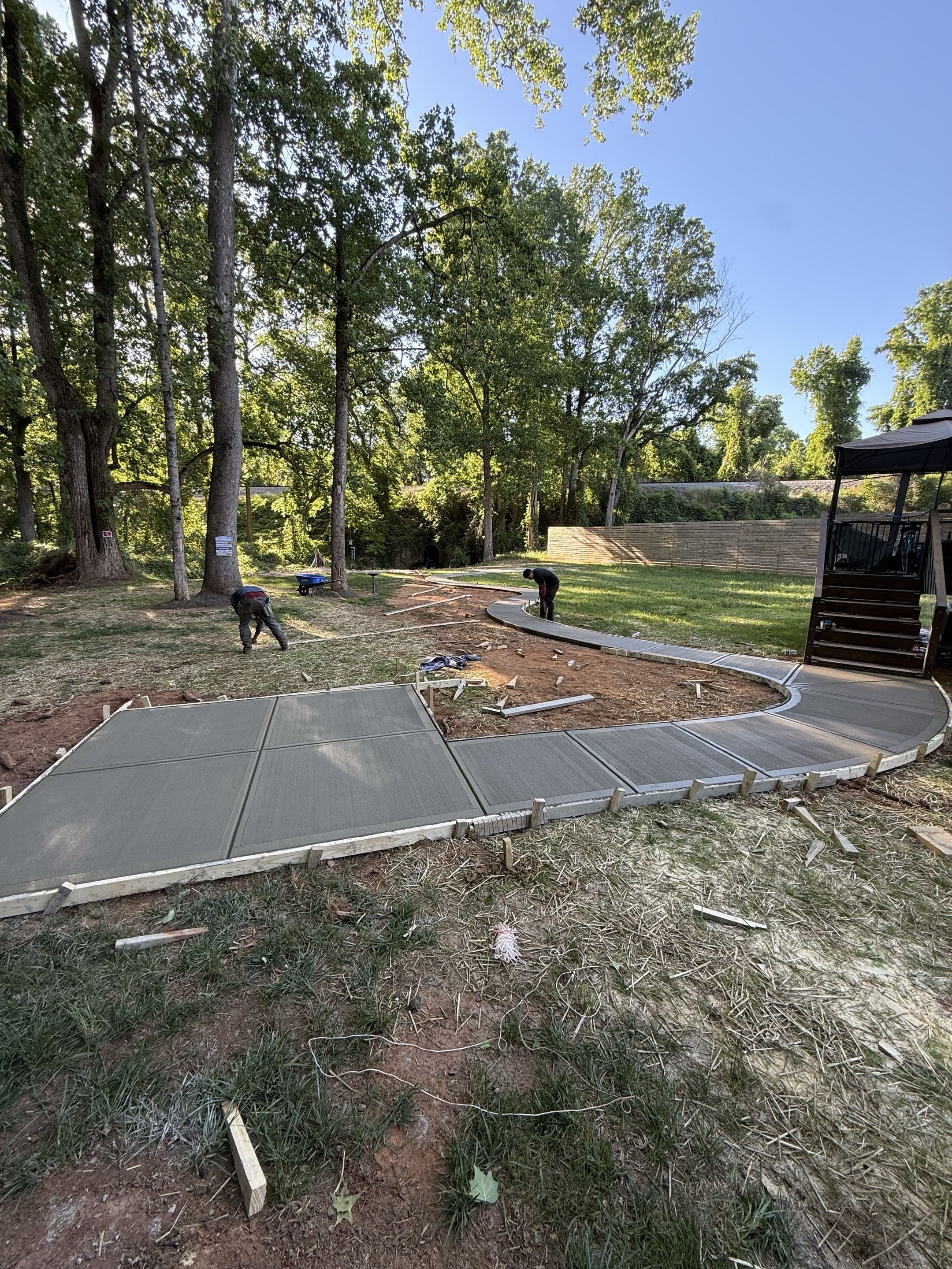 Stripping Forms, Dressing Edges — step 15 of a Local Concrete Co project in Charlotte, NC